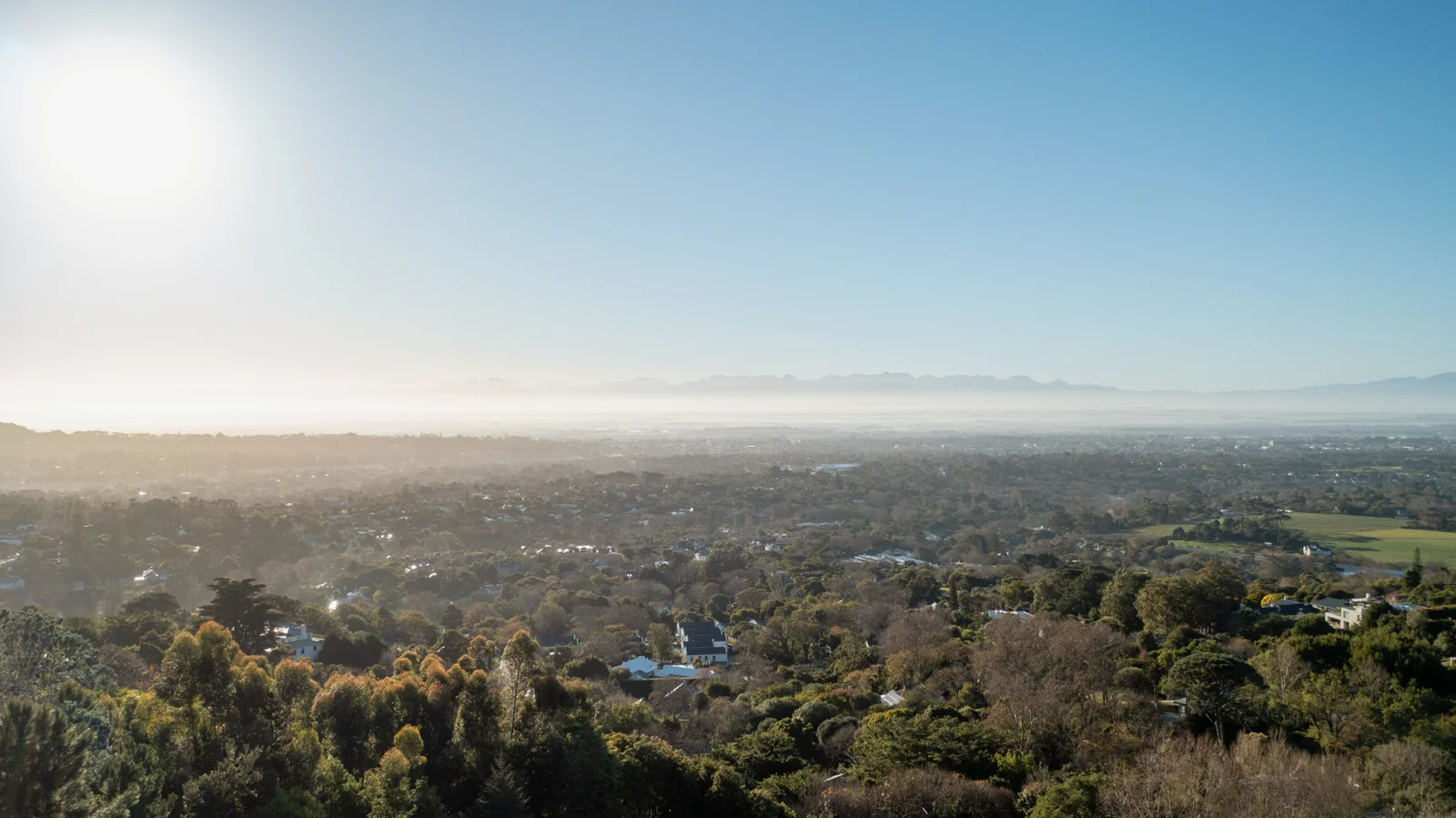 Real outlook across the Constantia Valley from the supplied site photography.